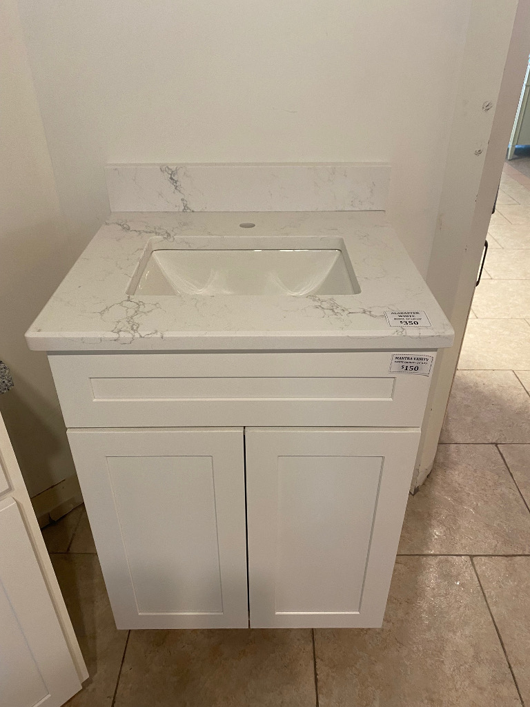 24 INCH WHITE SHAKER VANITY WITH 25 INCH ALABASTER WHITE QUARTZ TOP